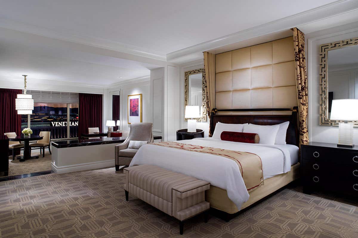 A suite featuring a king bed